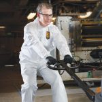 600-5069 KLEENGUARD™ A40 Liquid & Particle Protection Coveralls - in use - Integrity Cleanroom