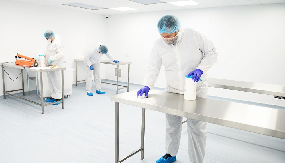 Photo of people working in a cleanroom environment - Integrity Cleanroom